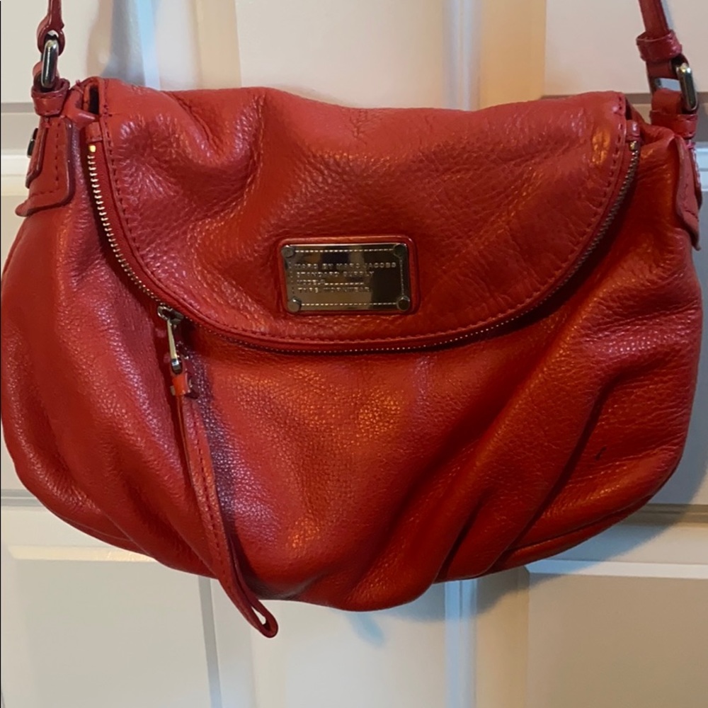 Red Marc by Marc Jacob’s purse .